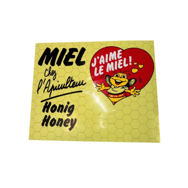 Affiche jaune à motif hexagonal avec mascotte dans un cœur rouge et textes MIEL, Honig Honey, J’aime le miel.